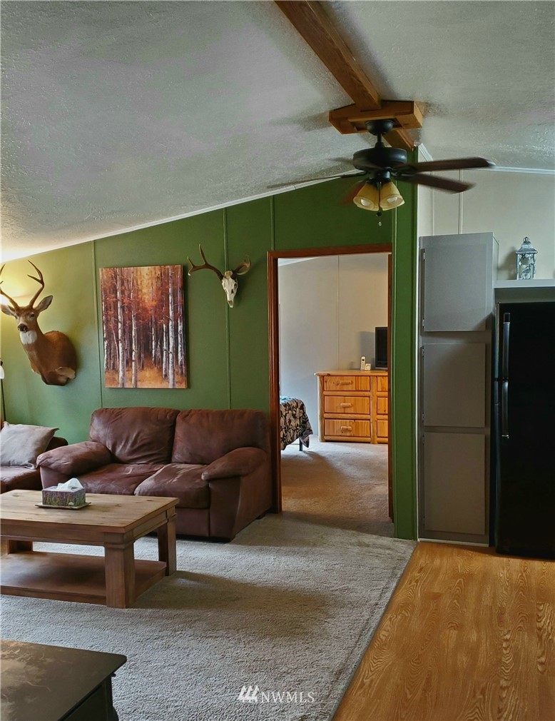 6851 South Pass Road Maple Falls, WA 98266 - Photo 19 of 34 a living room with furniture and a window