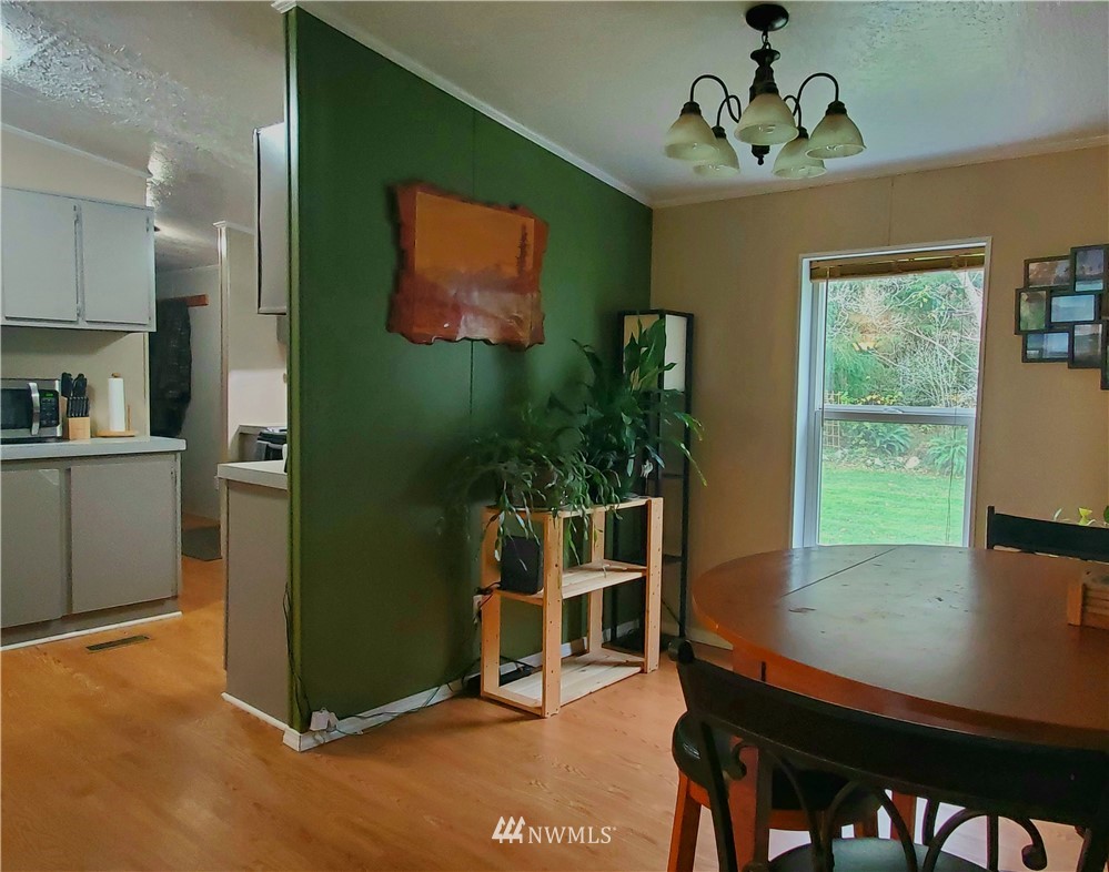 6851 South Pass Road Maple Falls, WA 98266 - Photo 25 of 34 a view of a dining room with furniture window and outside view