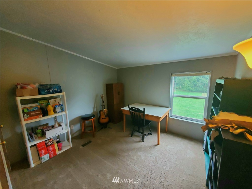 6851 South Pass Road Maple Falls, WA 98266 - Photo 26 of 34 a room with furniture and a window