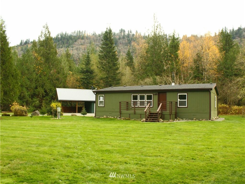6851 South Pass Road Maple Falls, WA 98266 - Photo 4 of 34 a front view of a house with yard