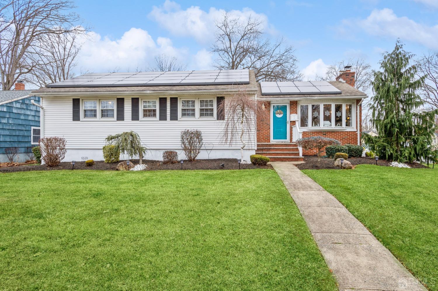 87 Stony Road Edison, NJ 08817 - Photo 1 of 26 a front view of house with yard and barbeque oven