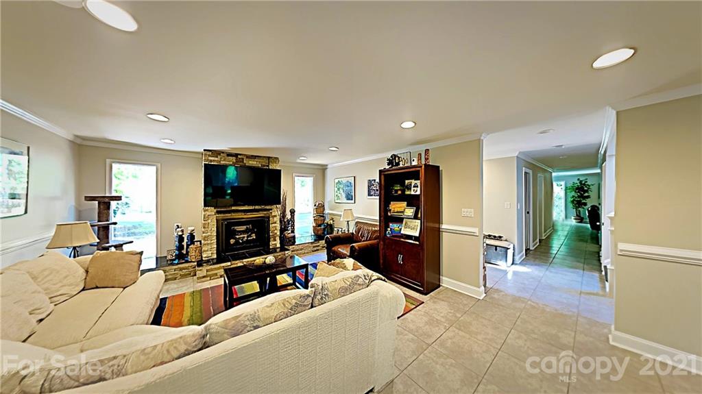 12 Duckhook Circle Lake Wylie, SC 29710 - Photo 11 of 30 a living room with furniture and a flat screen tv