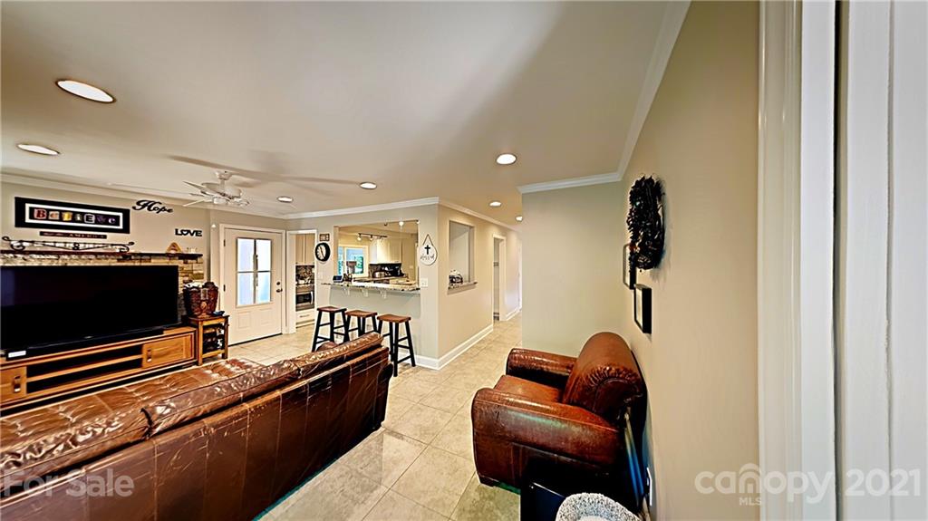 12 Duckhook Circle Lake Wylie, SC 29710 - Photo 12 of 30 a living room with furniture and a flat screen tv