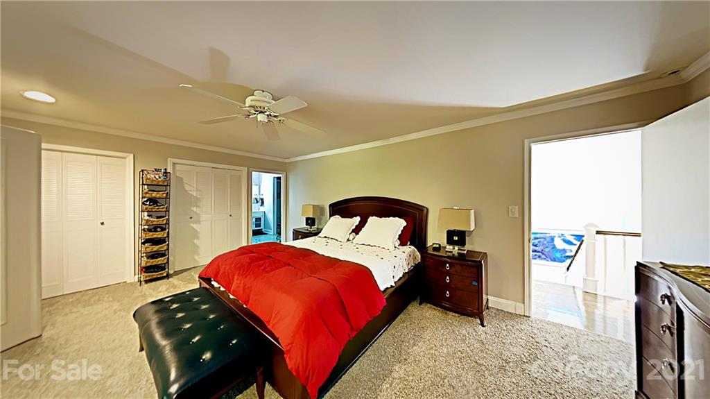 12 Duckhook Circle Lake Wylie, SC 29710 - Photo 15 of 30 a bedroom with a bed and a large window