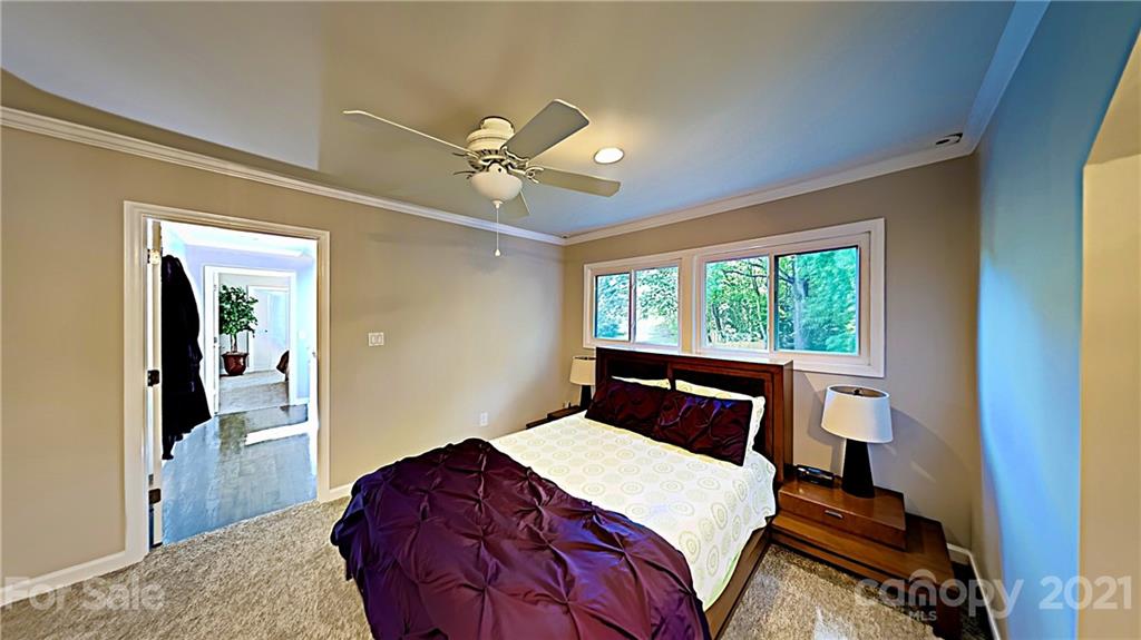 12 Duckhook Circle Lake Wylie, SC 29710 - Photo 21 of 30 a bedroom with a large bed and a window