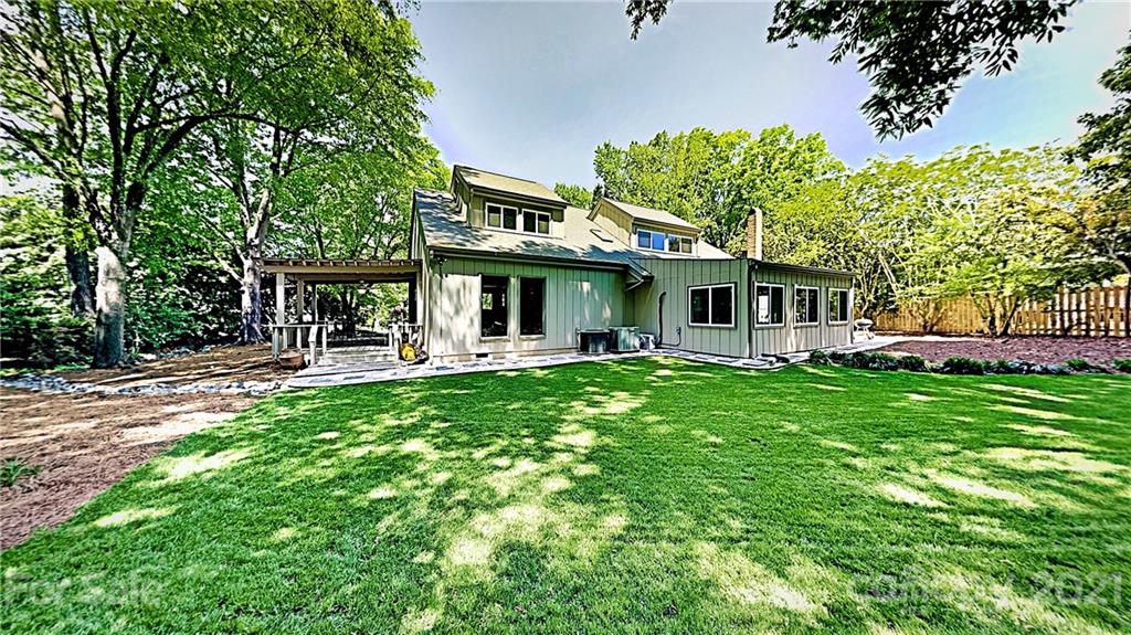12 Duckhook Circle Lake Wylie, SC 29710 - Photo 29 of 30 a view of a house with a backyard porch and sitting area