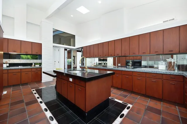 a view of a hallway with windows