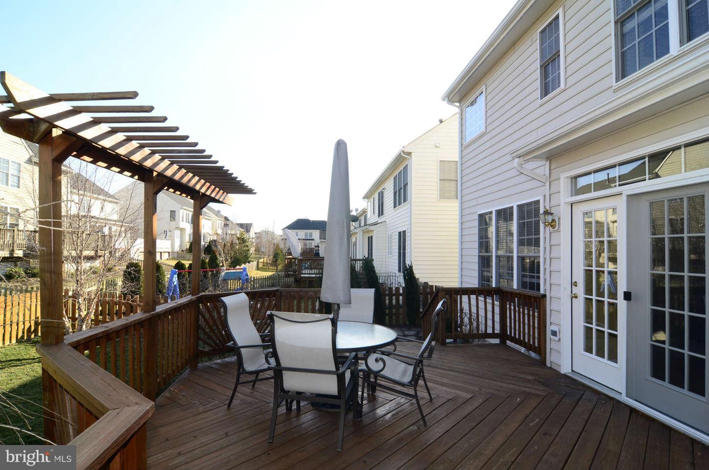 24766 Prairie Grass Drive Stone Ridge, VA 20105 - Photo 26 of 28 Nice big Deck off Kitchen