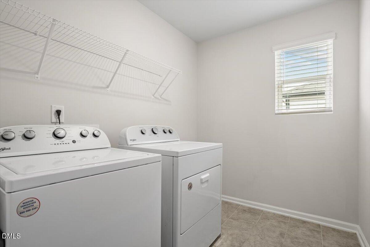 46 Coffee Tree Circle Clayton, NC 27527 - Photo 27 of 36 a utility room with dryer and washer