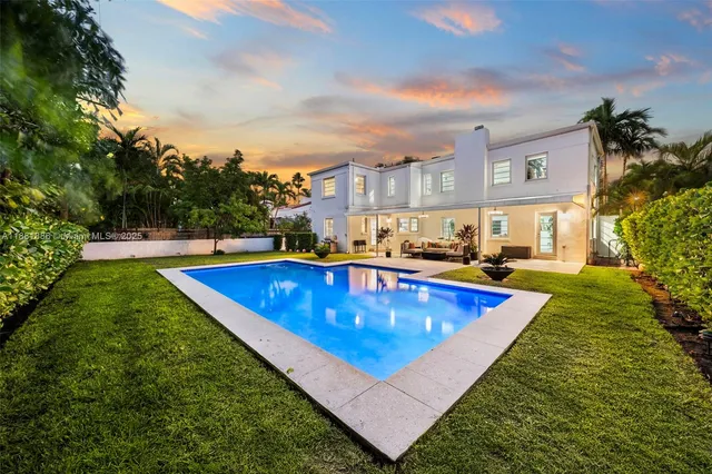 a view of an outdoor space pool patio and fire pit