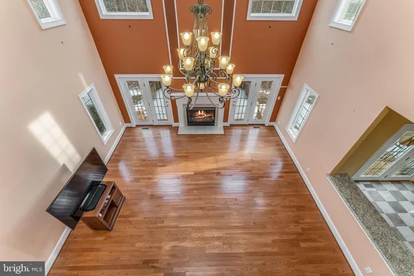 a view of an entryway with wooden floor