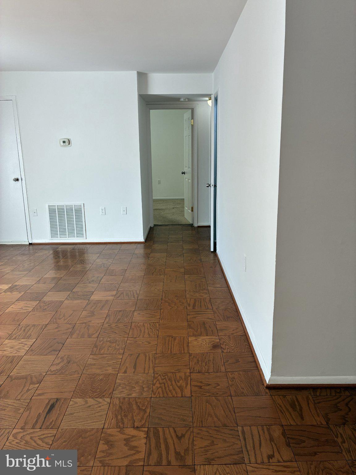 3801 Swann Road, Unit 201 Suitland, MD 20746 - Photo 5 of 9 Livingroom to back rooms