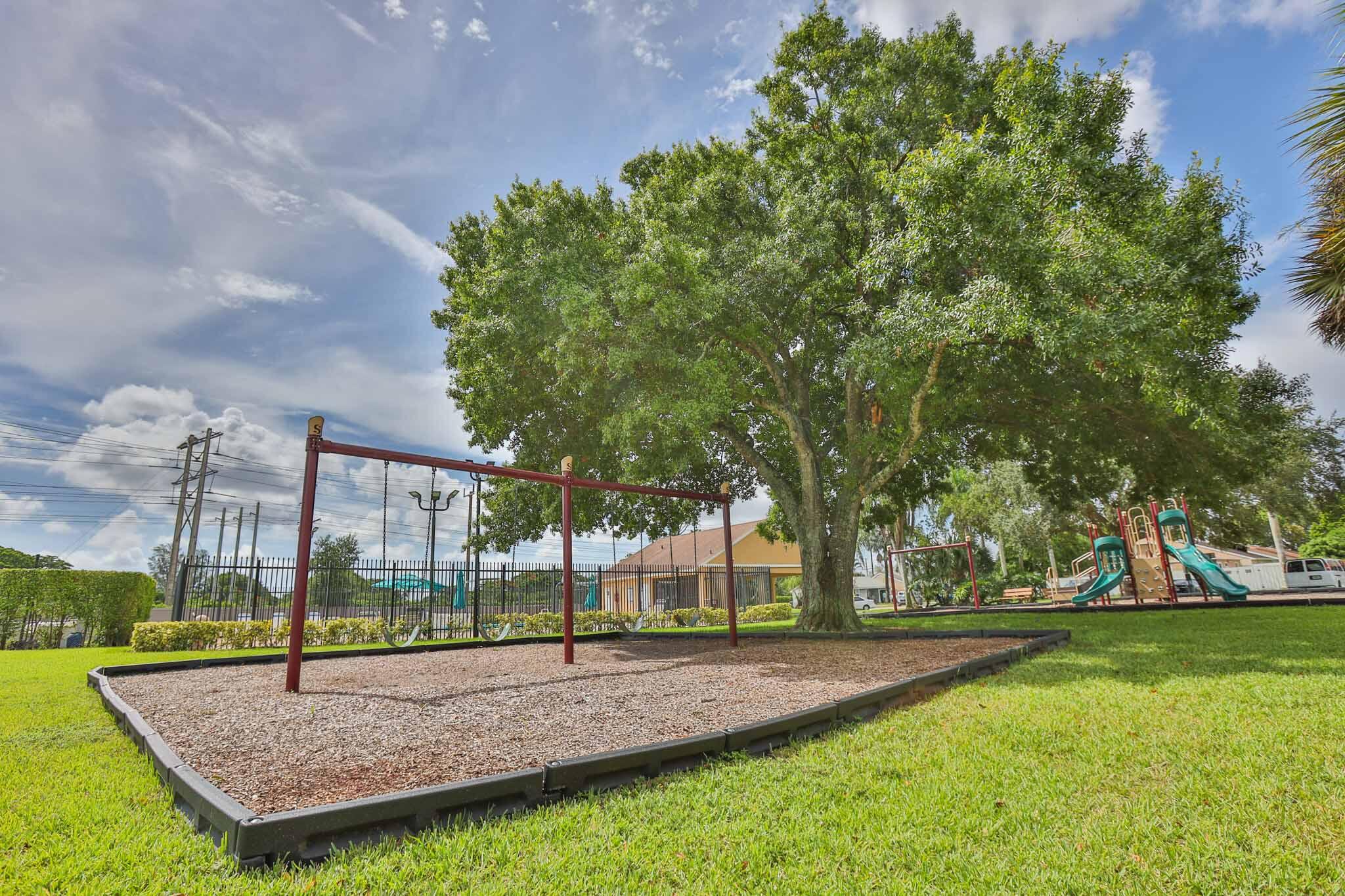 11223 Model Circle West Boca Raton, FL 33428 - Photo 33 of 35 a view of a park with large trees