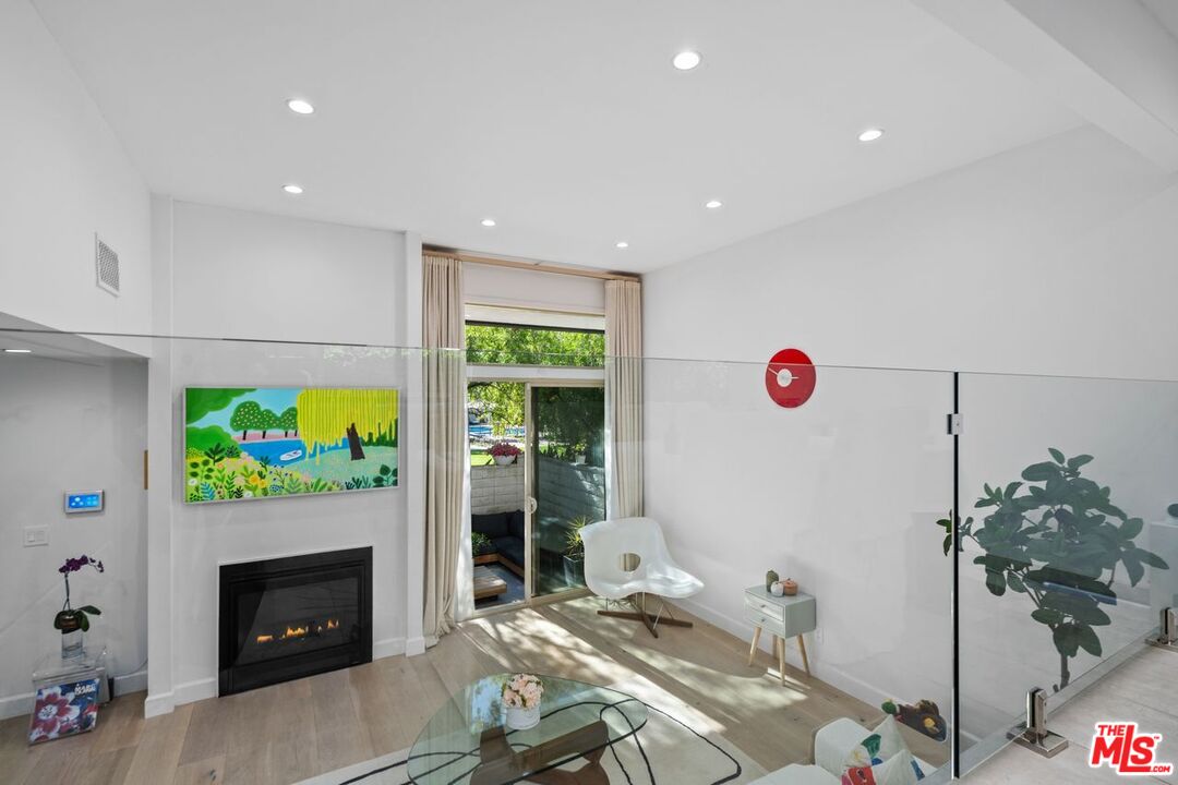 13231 Fiji Way, Unit F Marina del Rey, CA 90292 - Photo 12 of 40 a living room with furniture and a fireplace