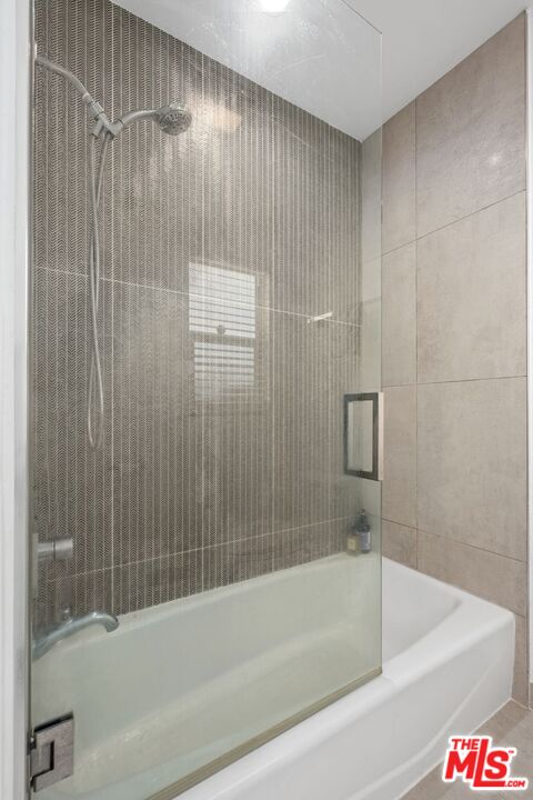 13231 Fiji Way, Unit F Marina del Rey, CA 90292 - Photo 26 of 40 a bathroom with a bathtub and a shower