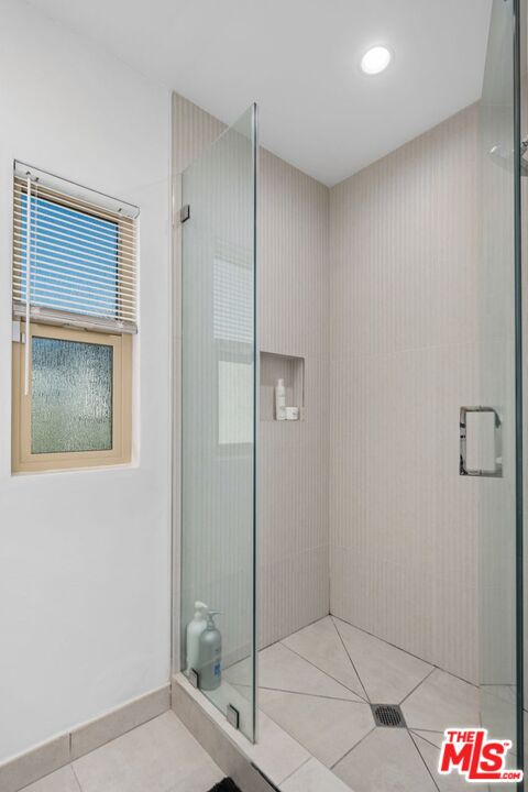 13231 Fiji Way, Unit F Marina del Rey, CA 90292 - Photo 32 of 40 a bathroom with a shower and a sink