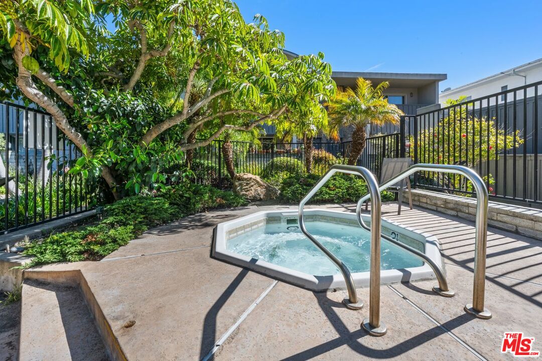 13231 Fiji Way, Unit F Marina del Rey, CA 90292 - Photo 39 of 40 a view of backyard with swimming pool and outdoor seating