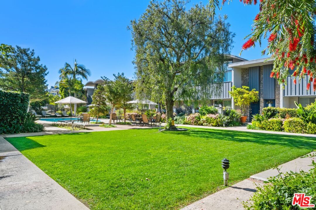 13231 Fiji Way, Unit F Marina del Rey, CA 90292 - Photo 40 of 40 a view of a big yard with plants and large trees