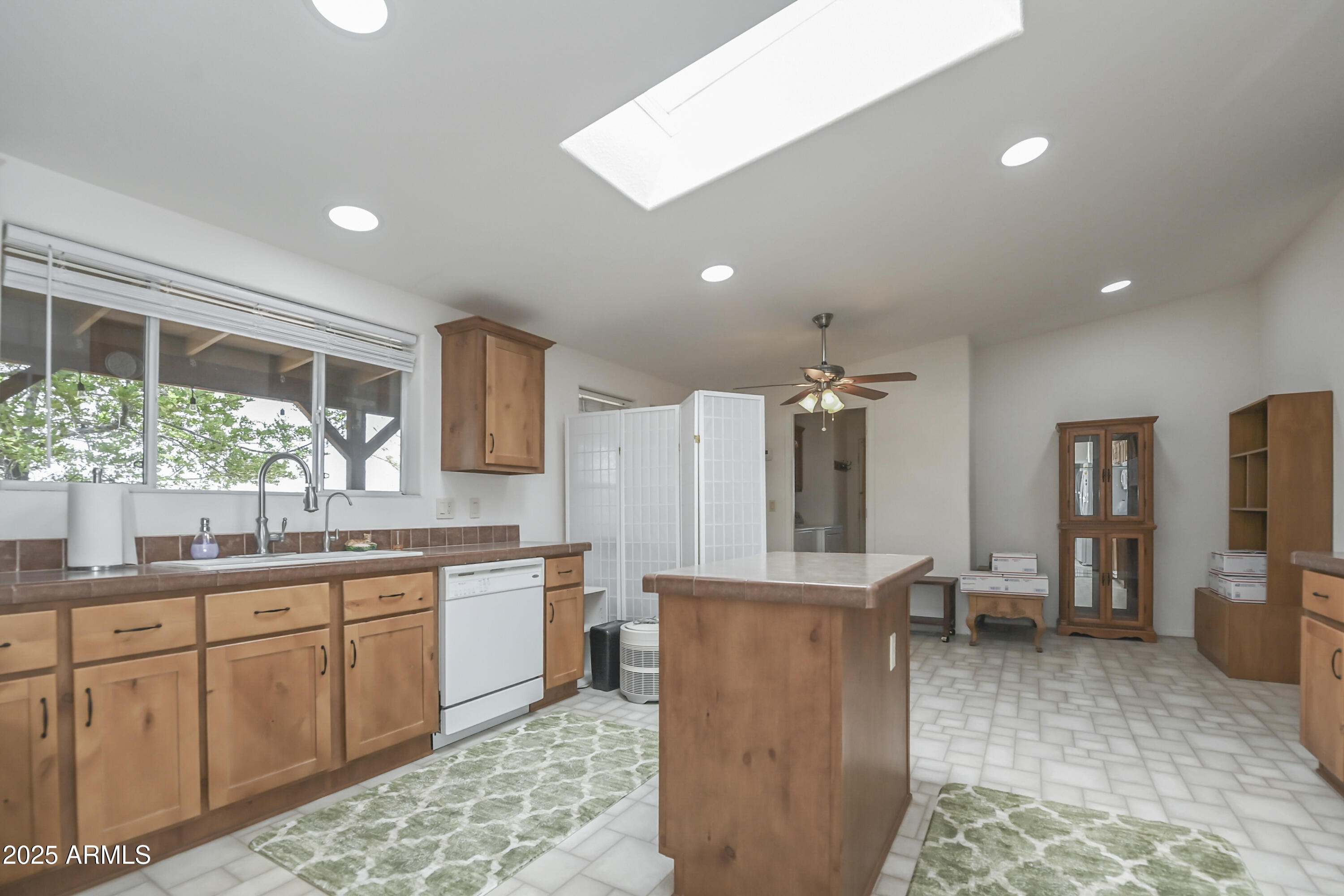 17985 Hunters Lane Dewey, AZ 86327 - Photo 11 of 45 a kitchen with stainless steel appliances granite countertop a sink and cabinets