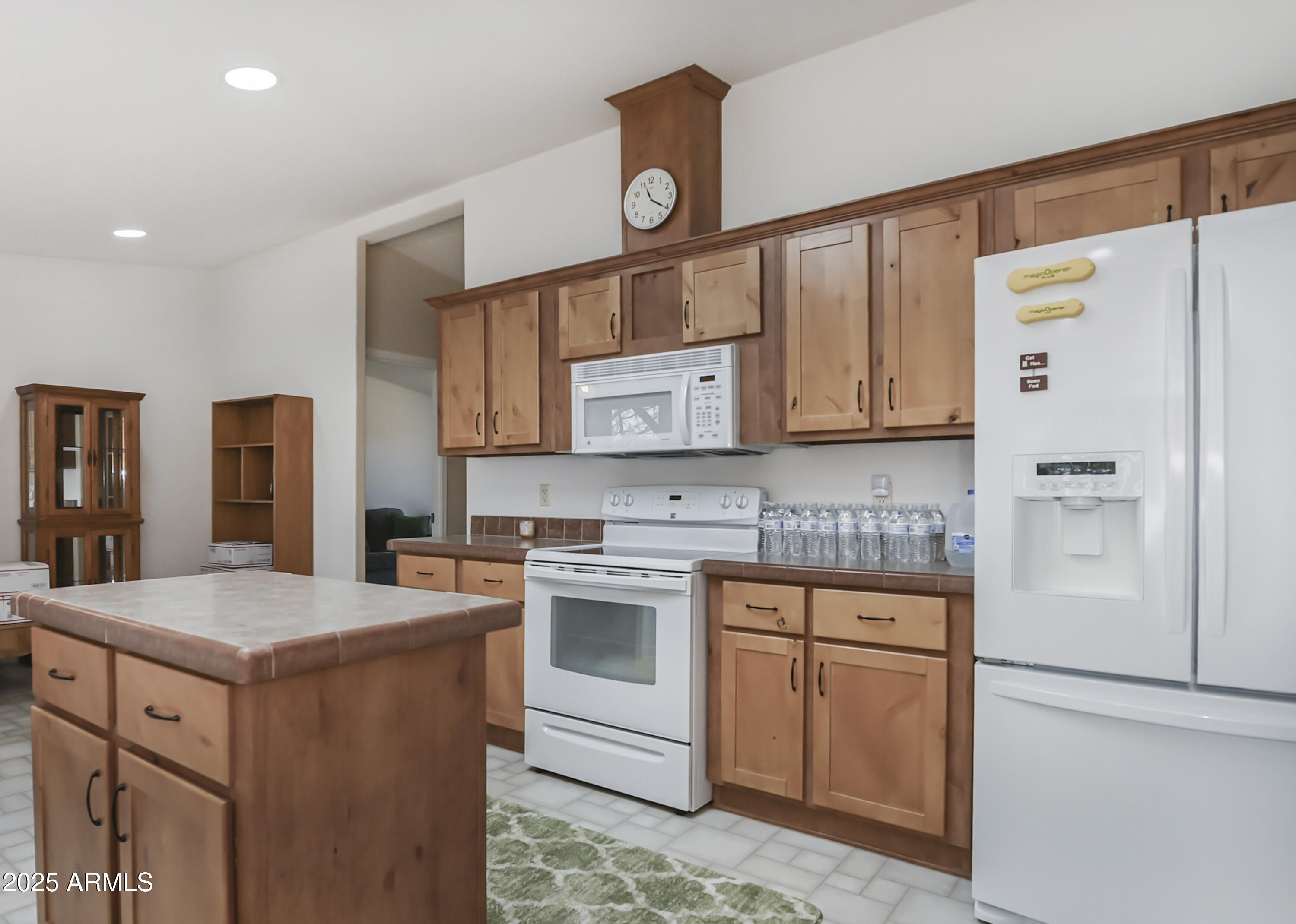 17985 Hunters Lane Dewey, AZ 86327 - Photo 12 of 45 a kitchen with a sink stove and refrigerator