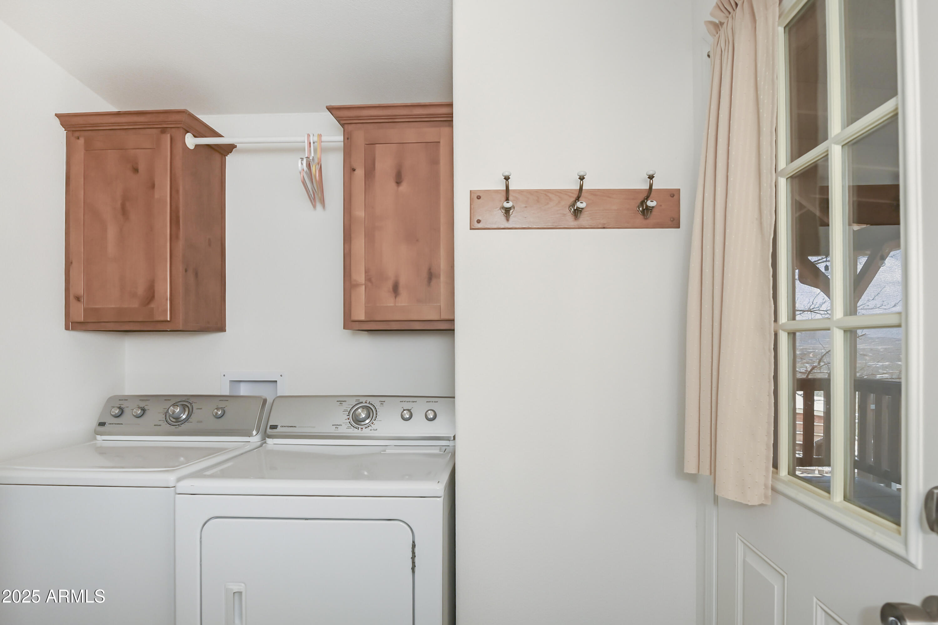 17985 Hunters Lane Dewey, AZ 86327 - Photo 15 of 45 a view of storage and utility room with washer and dryer