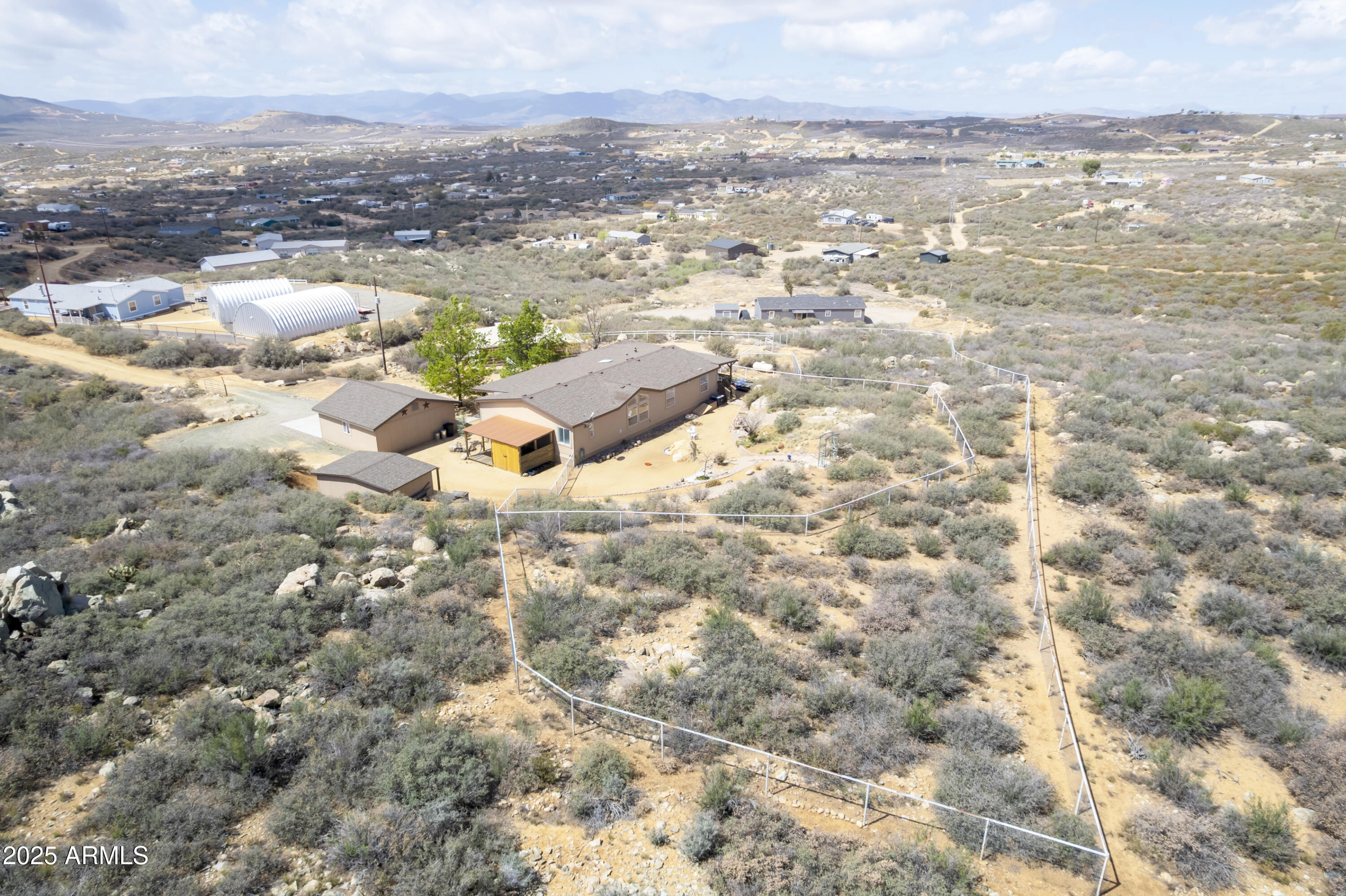 17985 Hunters Lane Dewey, AZ 86327 - Photo 42 of 45 an aerial view of residential houses with outdoor space