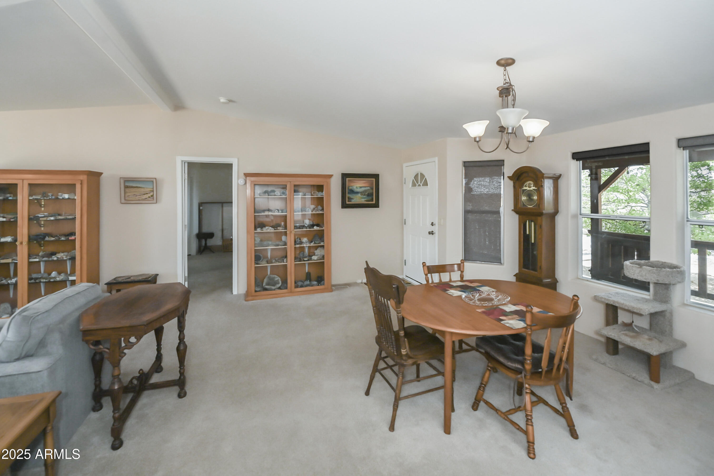 17985 Hunters Lane Dewey, AZ 86327 - Photo 9 of 45 a view of a dining room with furniture window and wooden floor