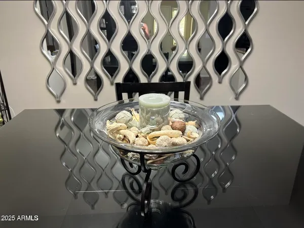 a table with wine bottles sitting on top of a table
