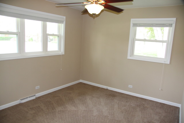 605 East Baldwin Road Palatine, IL 60074 - Photo 11 of 18 an empty room with a window