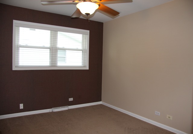 605 East Baldwin Road Palatine, IL 60074 - Photo 12 of 18 an empty room with a window
