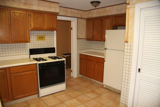605 East Baldwin Road Palatine, IL 60074 - Photo 13 of 18 a kitchen with stainless steel appliances granite countertop a stove a refrigerator and a sink