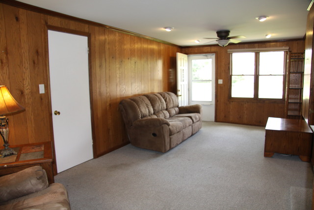 605 East Baldwin Road Palatine, IL 60074 - Photo 8 of 18 a living room with furniture and a large window