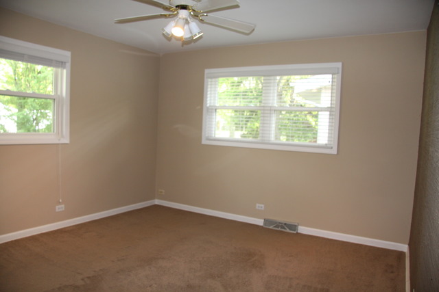 605 East Baldwin Road Palatine, IL 60074 - Photo 9 of 18 an empty room with a window