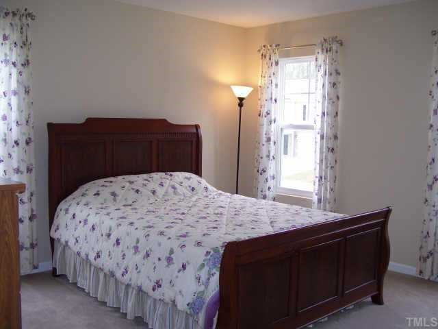 4268 Offshore Drive Raleigh, NC 27610 - Photo 9 of 11 Large 3rd upstairs bedroom.
