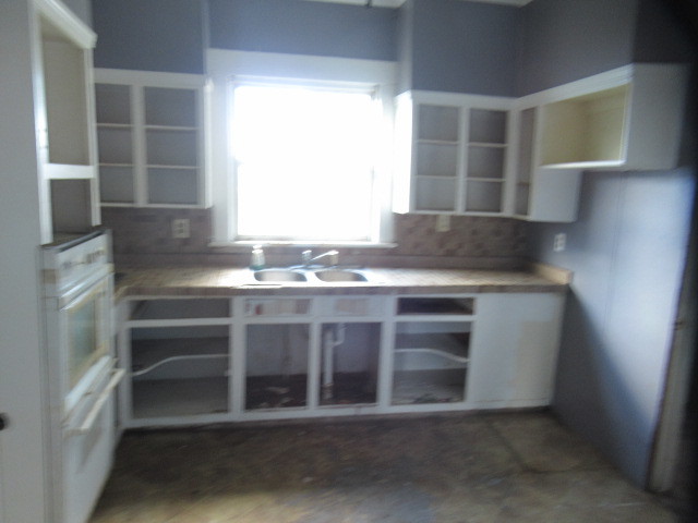 19608 Henning Road Danville, IL 61834 - Photo 8 of 9 a kitchen with a sink and a window