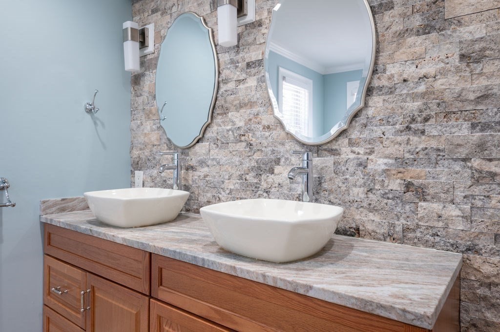 1 Learned Lane Salisbury, MA 01952 - Photo 19 of 41 a bathroom with a sink and a mirror