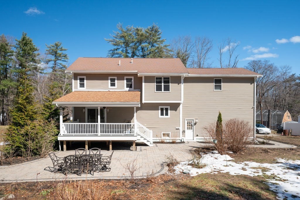1 Learned Lane Salisbury, MA 01952 - Photo 2 of 41 a front view of a house with a yard