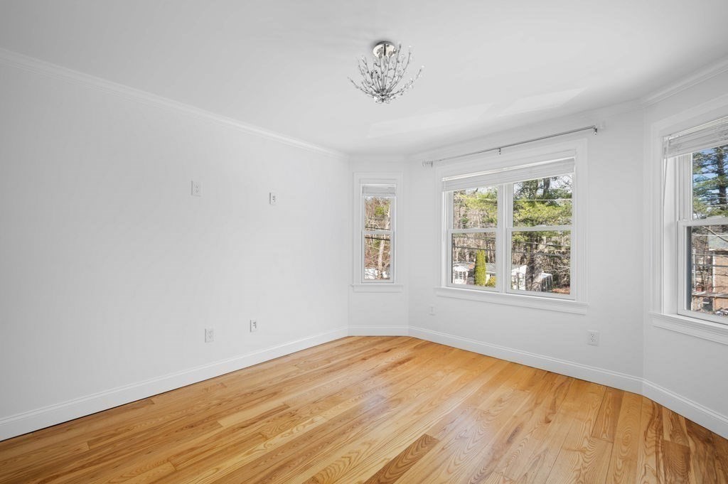 1 Learned Lane Salisbury, MA 01952 - Photo 25 of 41 a view of empty room with wooden floor and fan