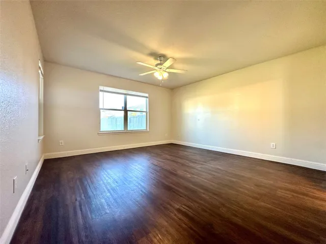 a view of a kitchen and a window