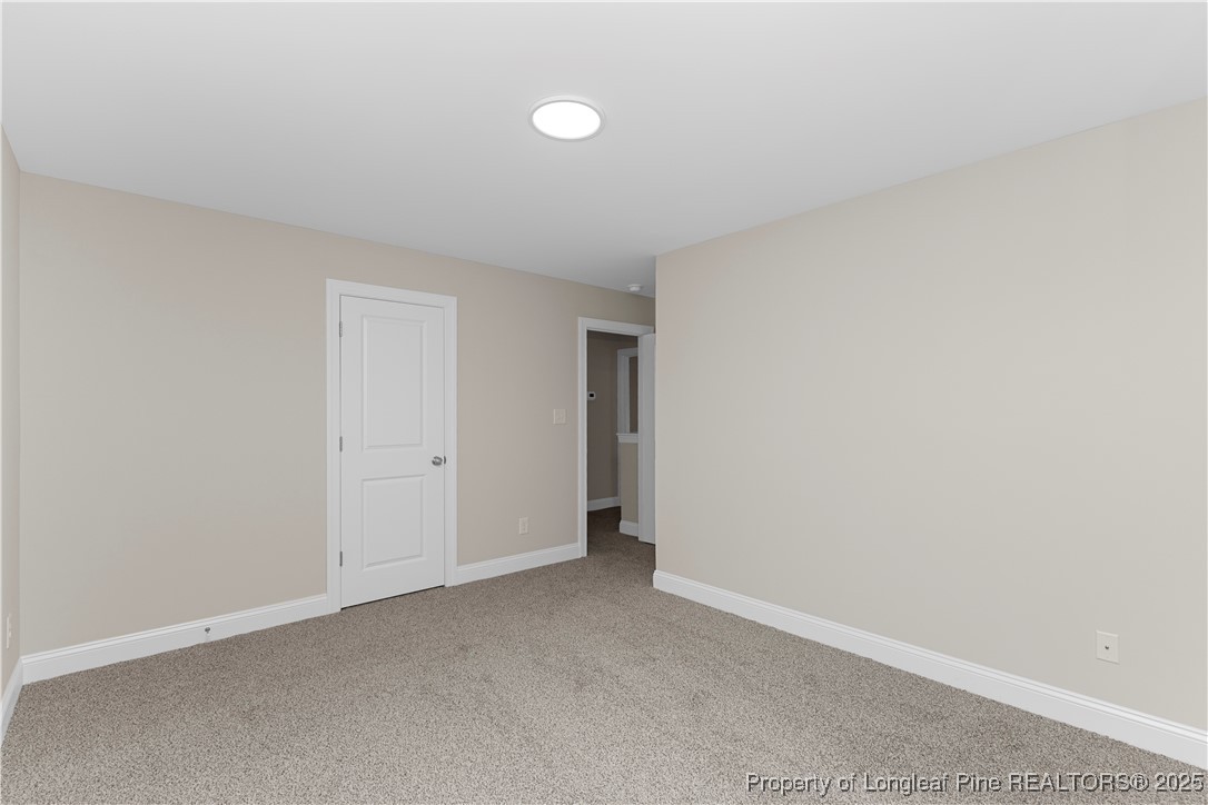162 Surles Landing Way Benson, NC 27504 - Photo 22 of 28 a view of an empty room
