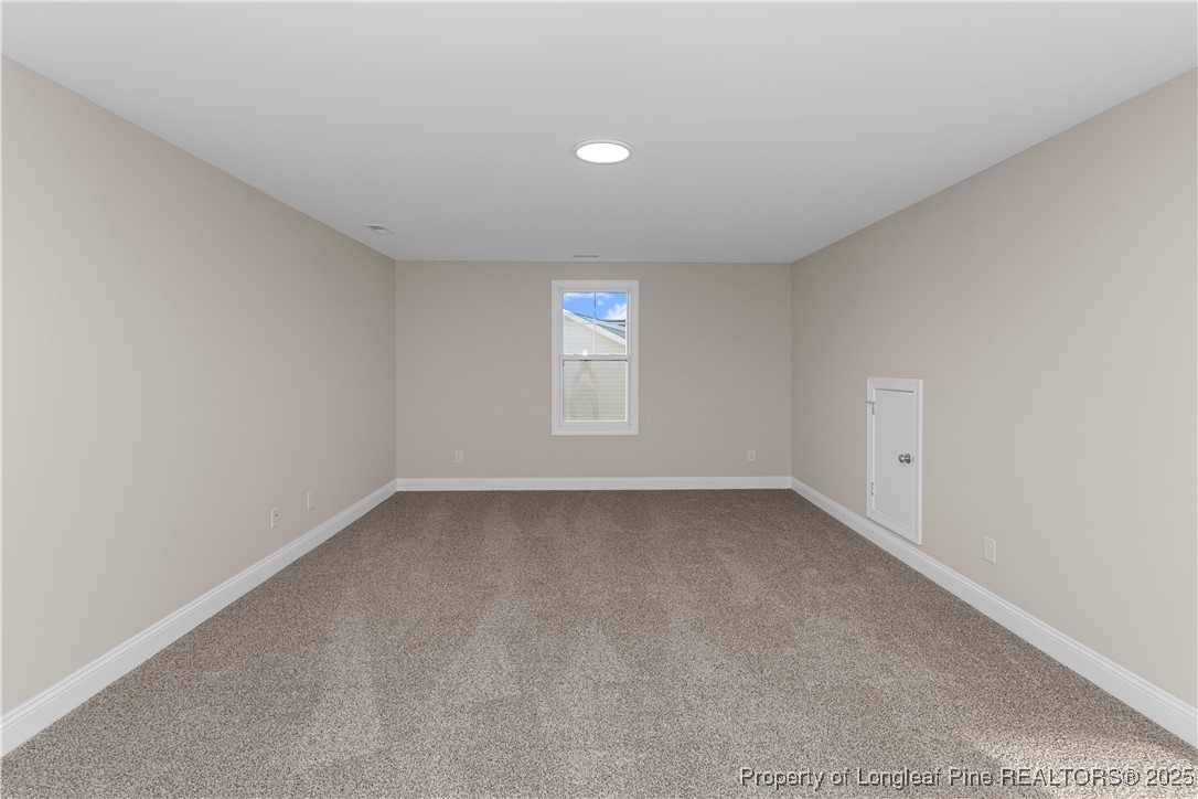 162 Surles Landing Way Benson, NC 27504 - Photo 24 of 28 a view of a window in an empty room