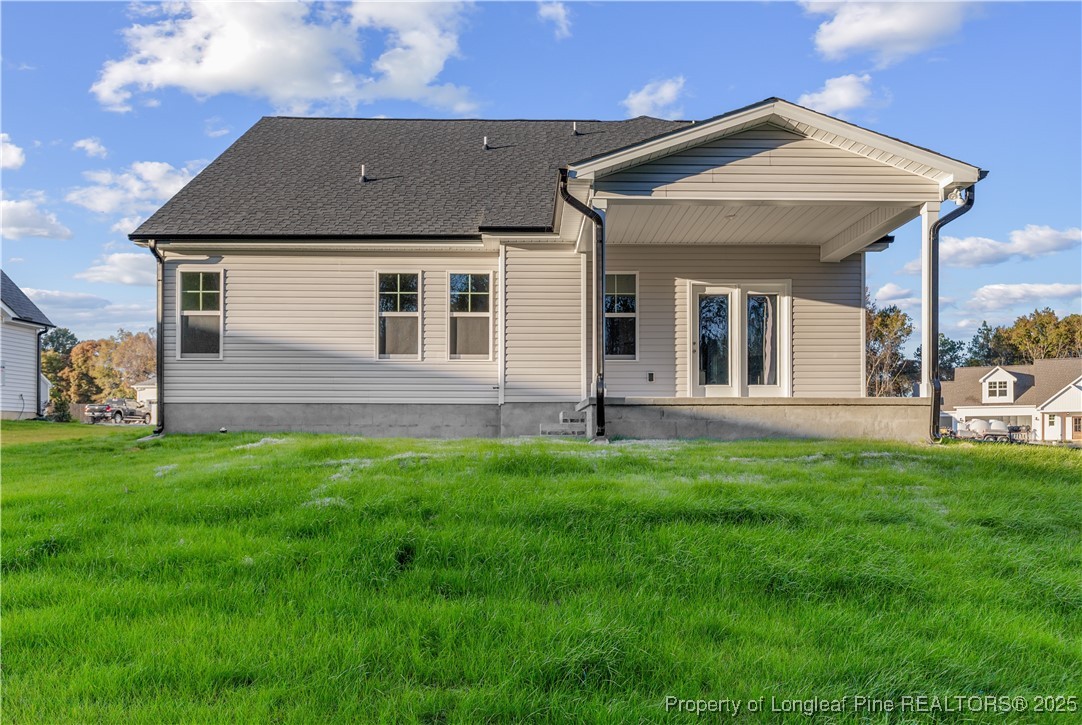 162 Surles Landing Way Benson, NC 27504 - Photo 28 of 28 a front view of a house with a yard