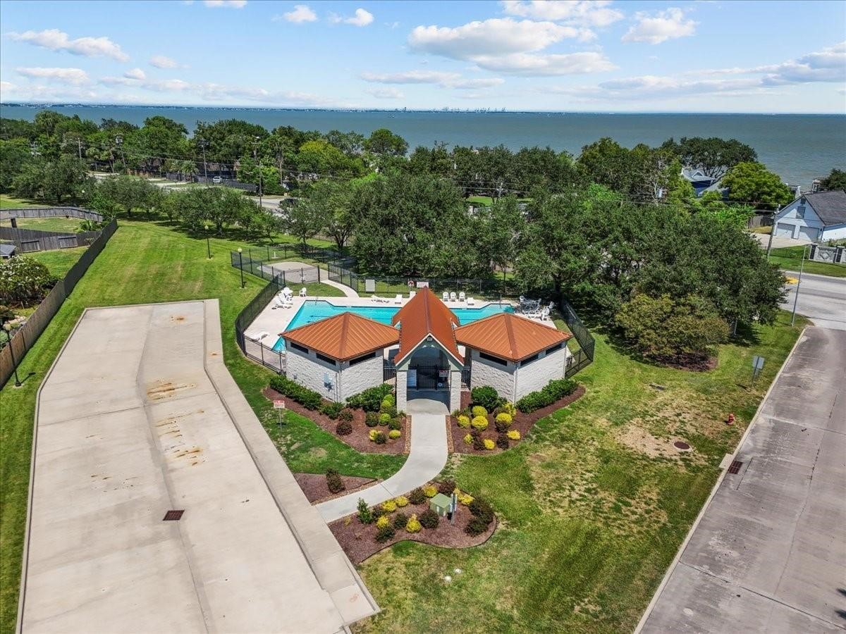 5111 Bay Lane Bacliff, TX 77518 - Photo 44 of 48 an aerial view of a house with a garden and lake view