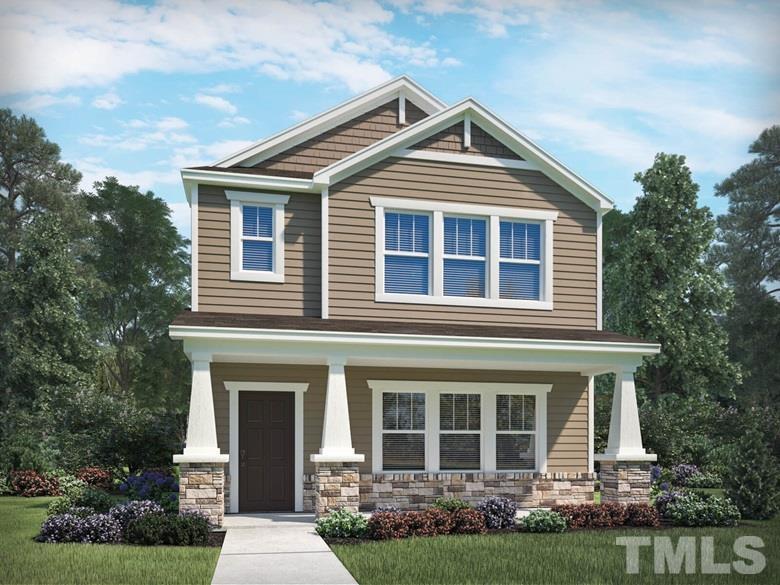 835 Firebrick Drive Cary, NC 27519 - Photo 1 of 4 a front view of a house with a yard