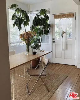 a vase of flowers sitting on a table