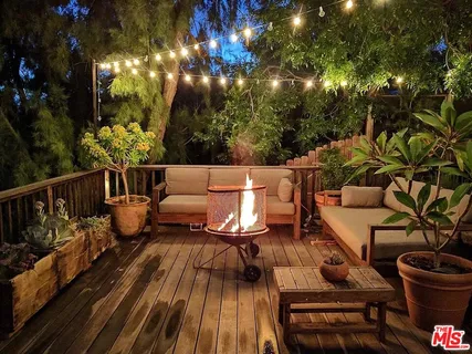 a view of a balcony with chairs