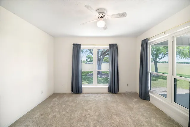 a bathroom with a tub and shower