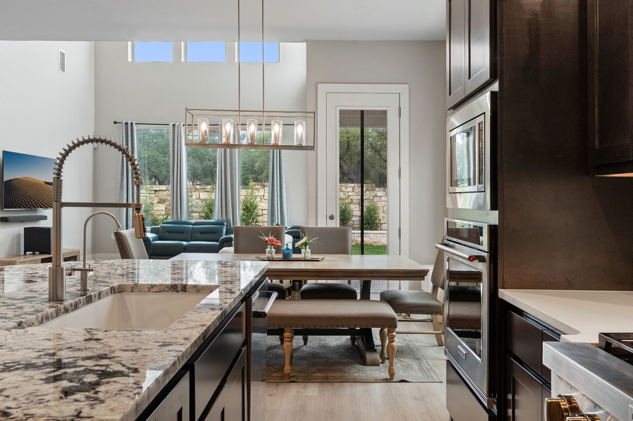 244 Diamondback Drive Georgetown, TX 78628 - Photo 4 of 37 Gourmet kitchen with stainless steel appliances, and a deep basin sink with a gooseneck faucet