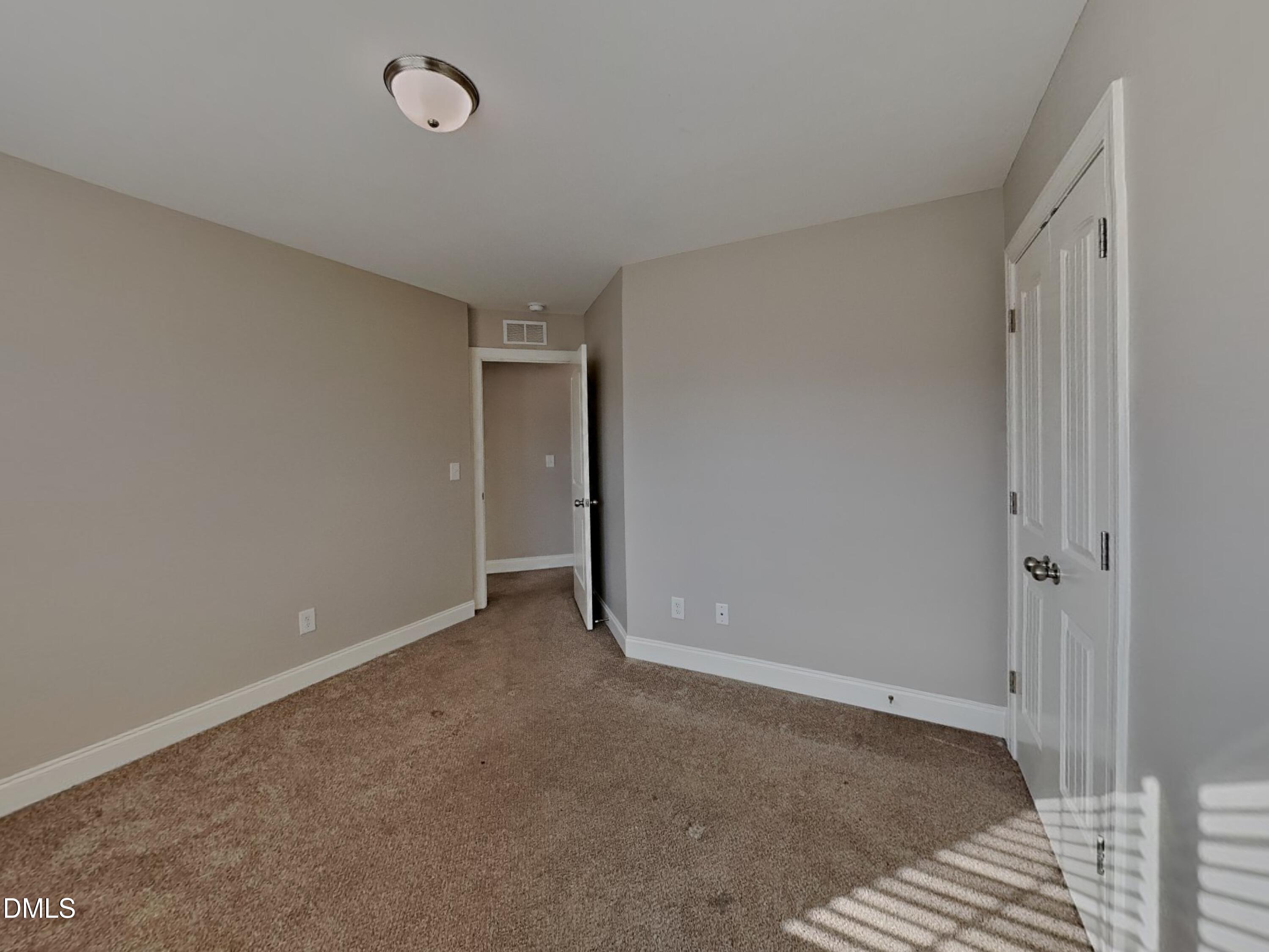 93 Jonalker Court Clayton, NC 27520 - Photo 14 of 17 a view of an empty room
