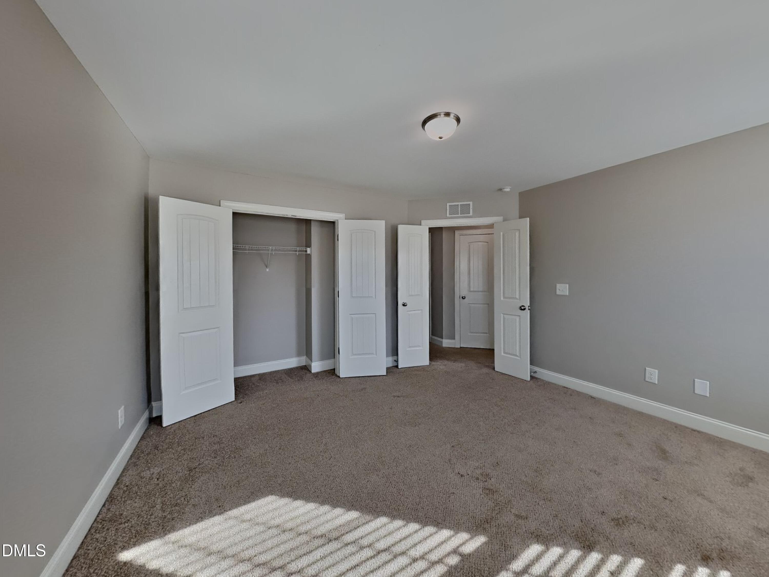 93 Jonalker Court Clayton, NC 27520 - Photo 10 of 17 a view of an empty room